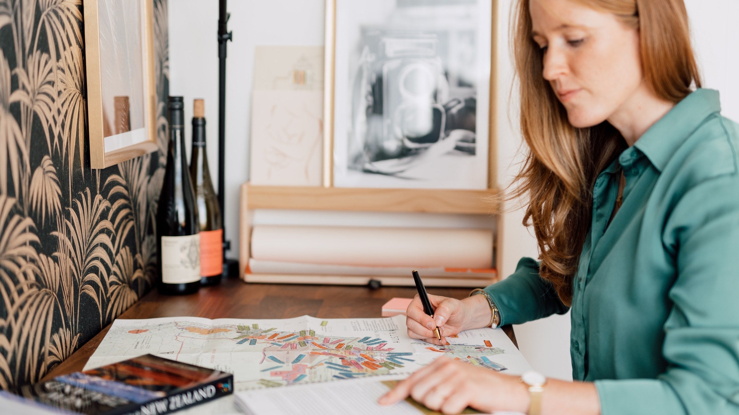 Margot van Lieshout planning her WSET Diploma D3 Theory exam at her desk, colour-annotating a wine map, on Wine with Margot
